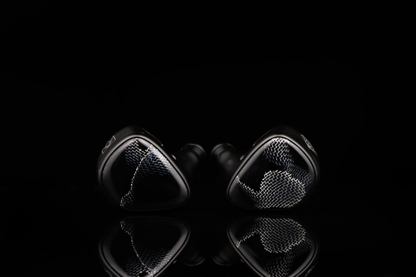 Onyx IEM's with a faceplate featuring wire mesh.
