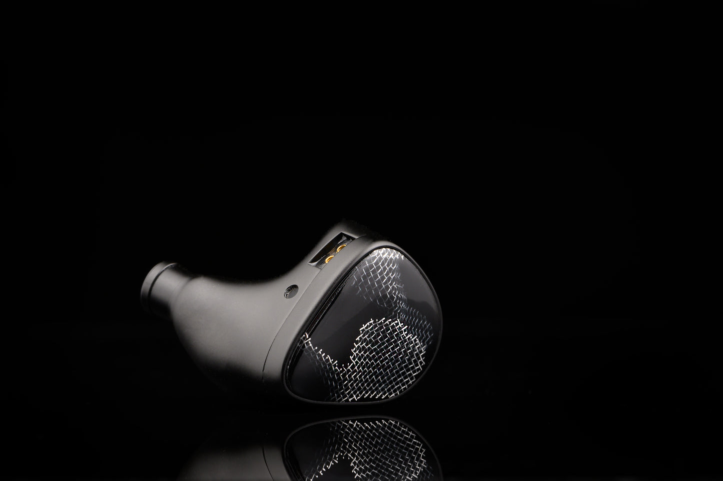 Onyx IEM's with a faceplate featuring wire mesh.