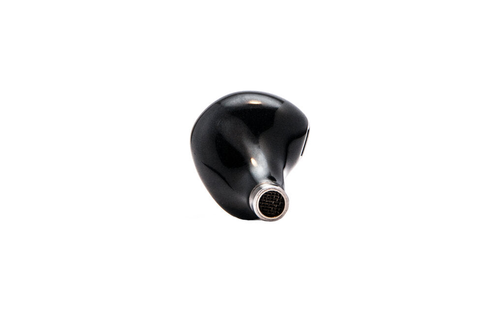 photo of Khan IEM with black and white marbled faceplate