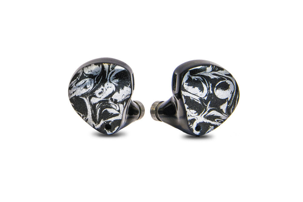 photo of Khan IEM with black and white marbled faceplate