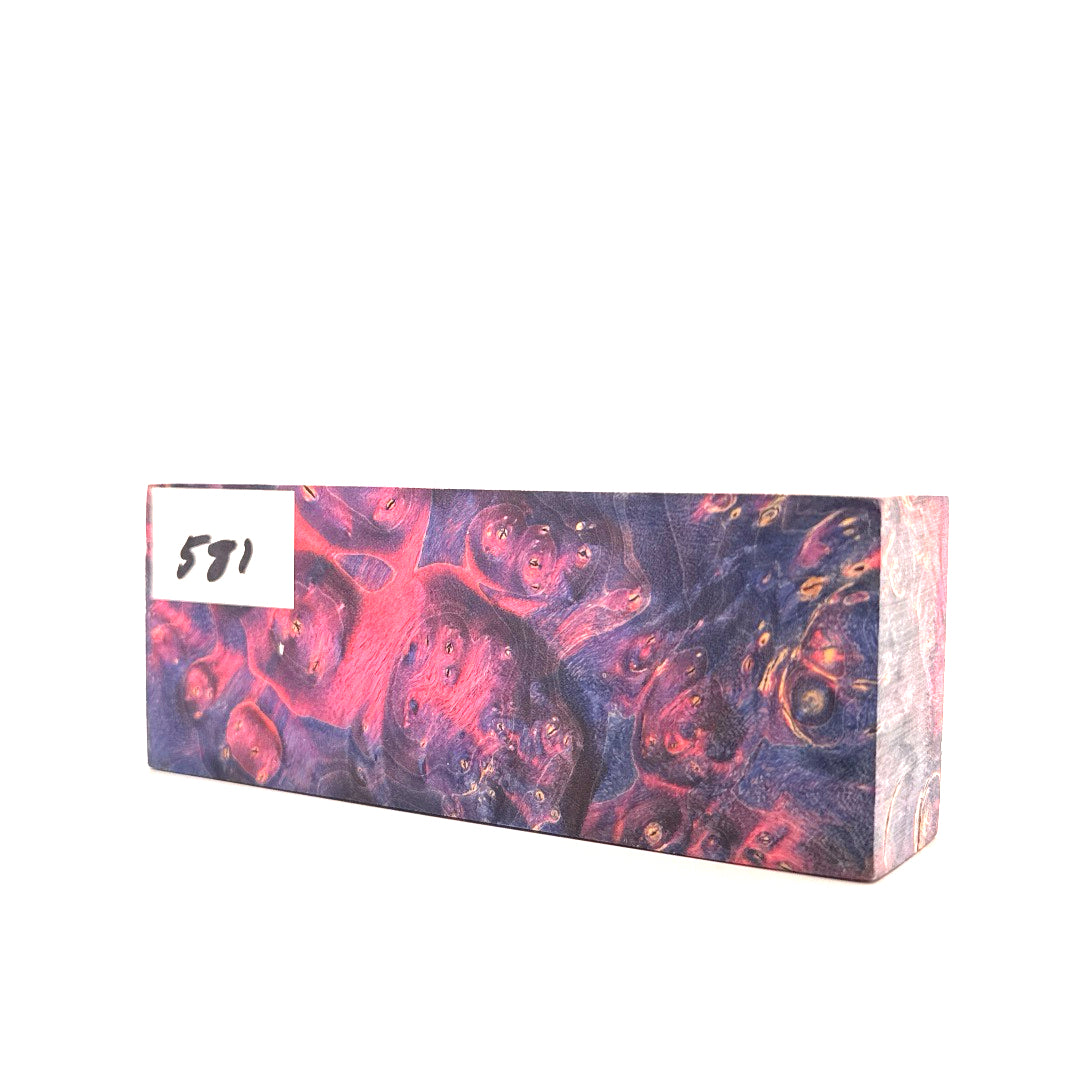 Marbled pink and purple block with a white label on a white background