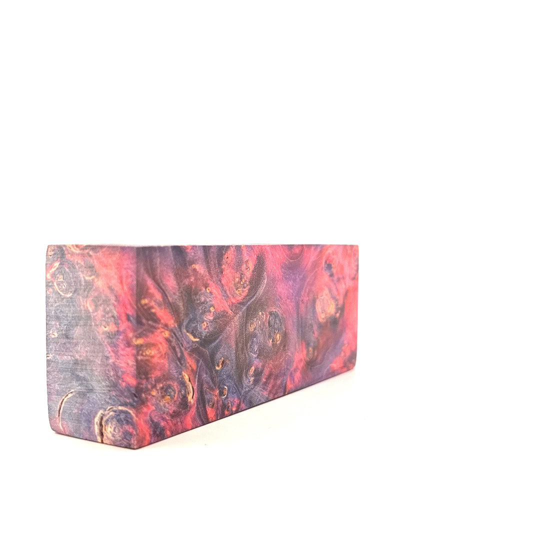 Marbled pink and purple block on a white background