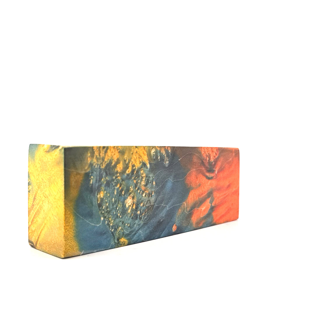 Colorful rectangular block with abstract design on a white background