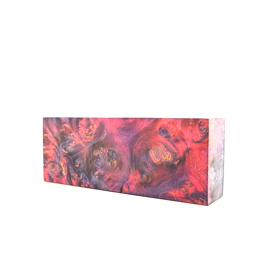 Rectangular block with a colorful, swirling pattern on a white background