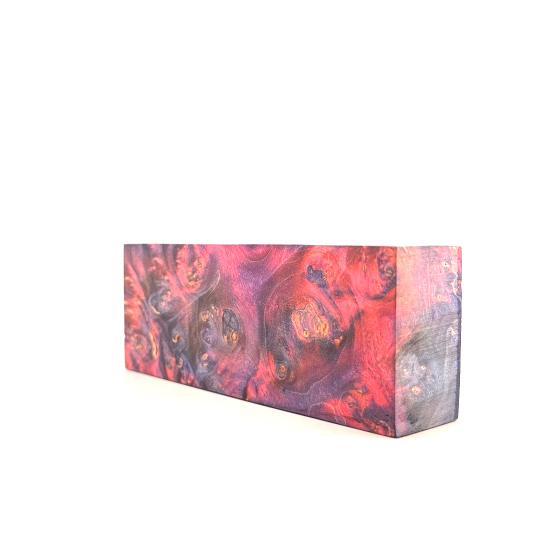 Rectangular block with a colorful abstract design on a white background