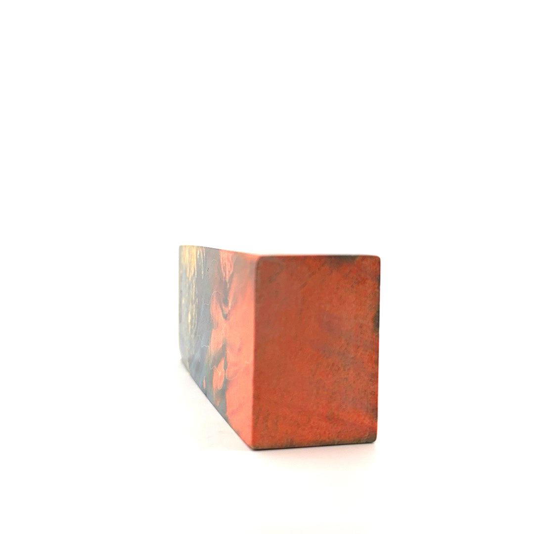 Block of wood copper colored