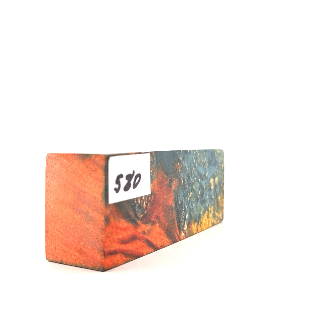Colorful rectangular block with a label on a white background