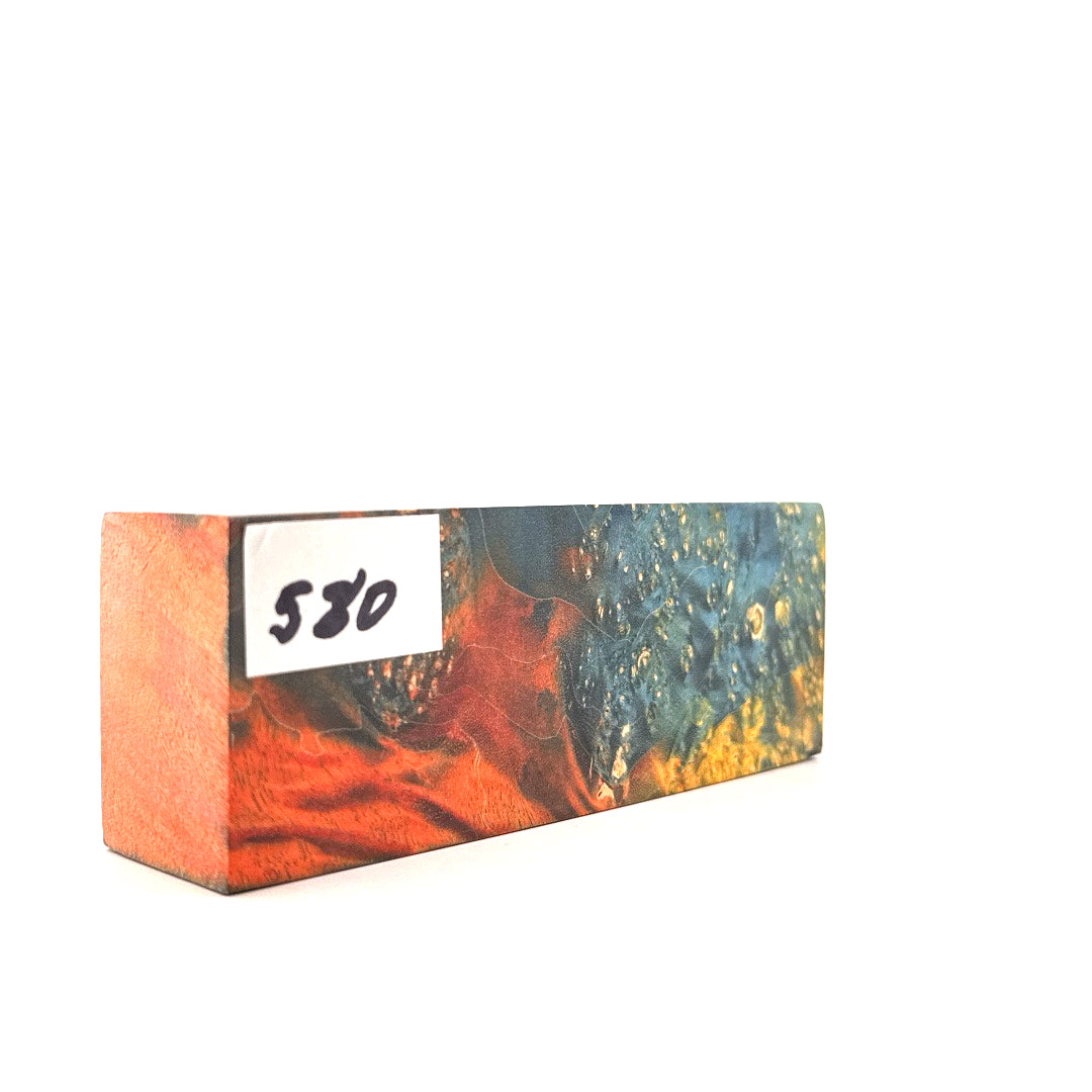 Colorful rectangular block with a label displaying the number 580 on a white background