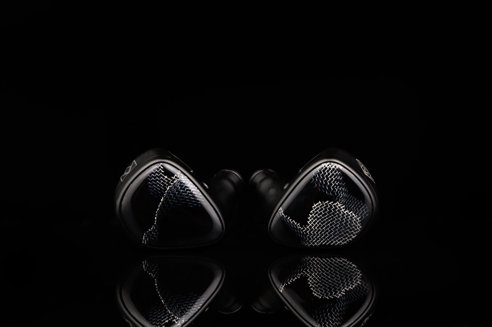 Onyx IEM's with a faceplate featuring wire mesh.