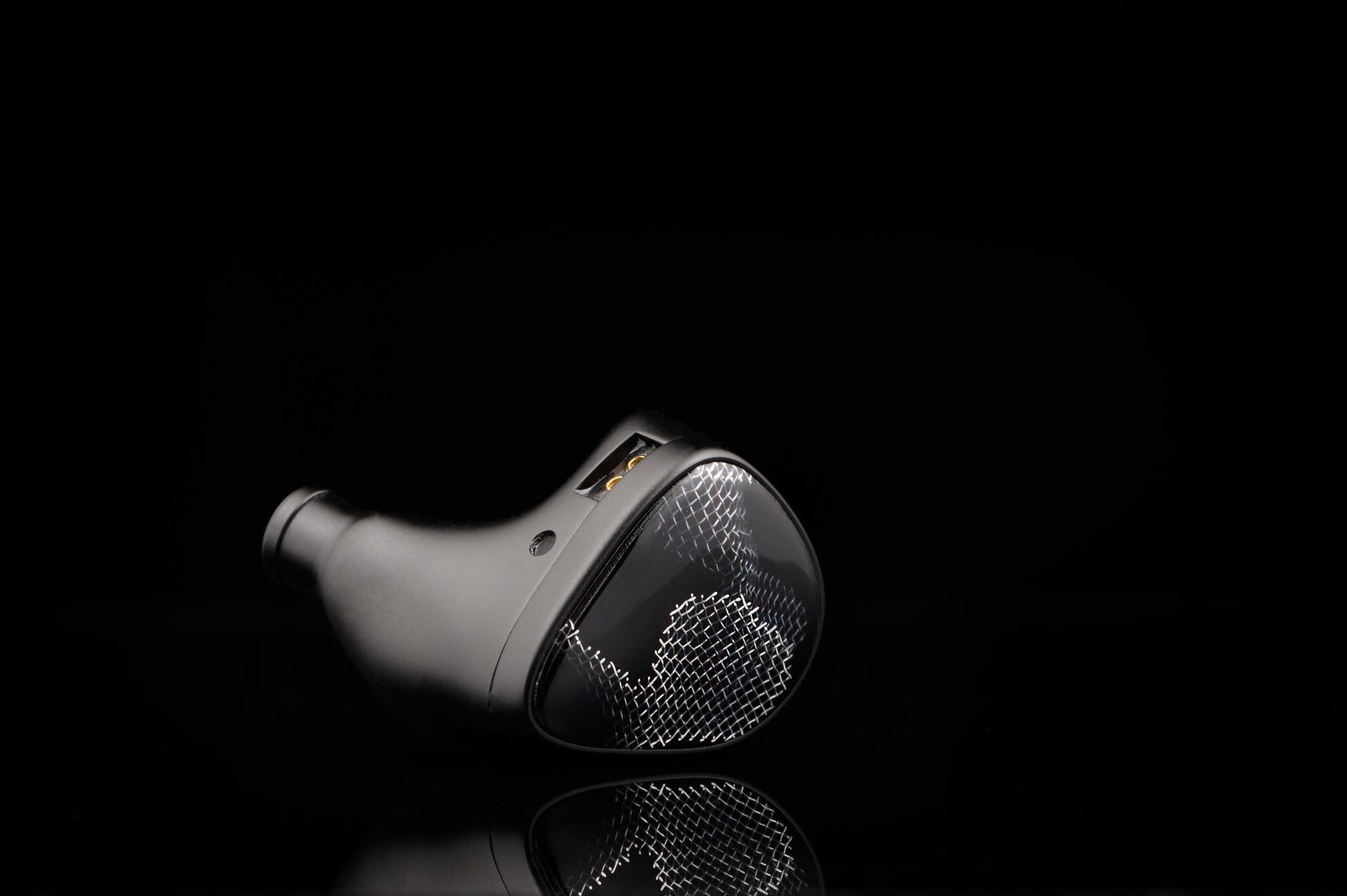 Onyx IEM's with a faceplate featuring wire mesh.