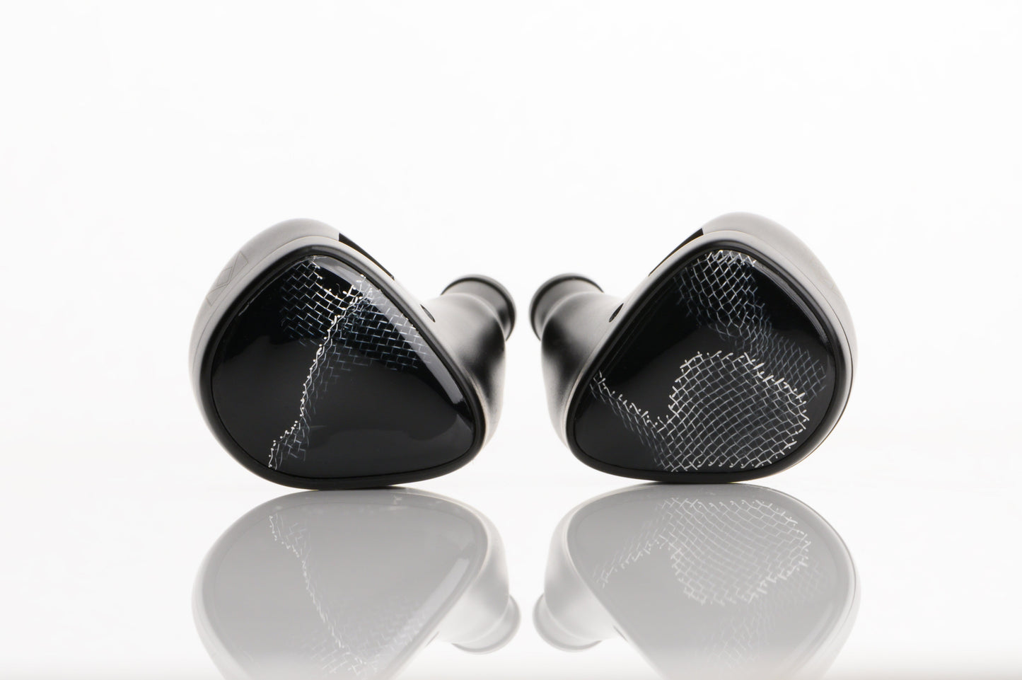 Onyx IEM's with a faceplate featuring wire mesh.