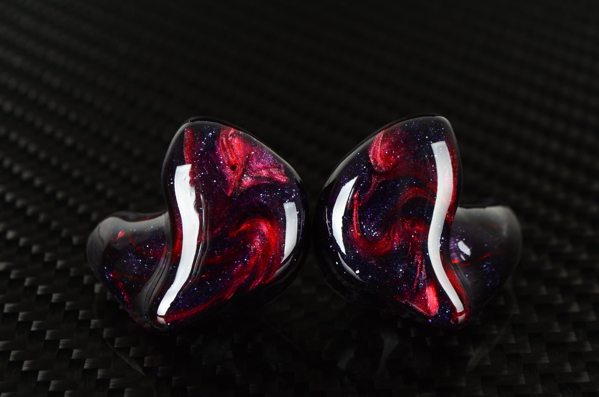Pair of Kaiser Encore IEM's featuring a galaxy like pattern on the faceplate and shell.