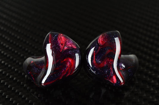 Pair of Kaiser Encore IEM's featuring a galaxy like pattern on the faceplate and shell.